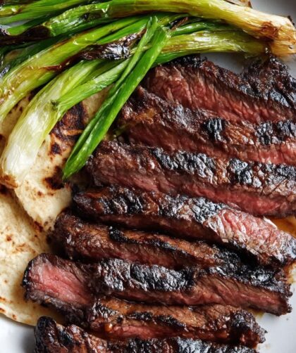 Bobby Flay Korean-Style Marinated Skirt Steak with Grilled Scallions and Warm Tortillas Recipe