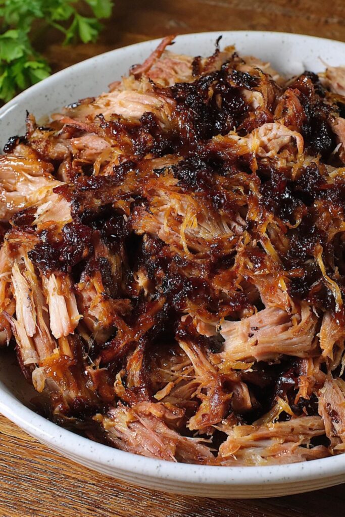 Bobby Flay Slow Smoked Pork Shoulder with Napa Cabbage Slaw and Queso Fresco Recipe